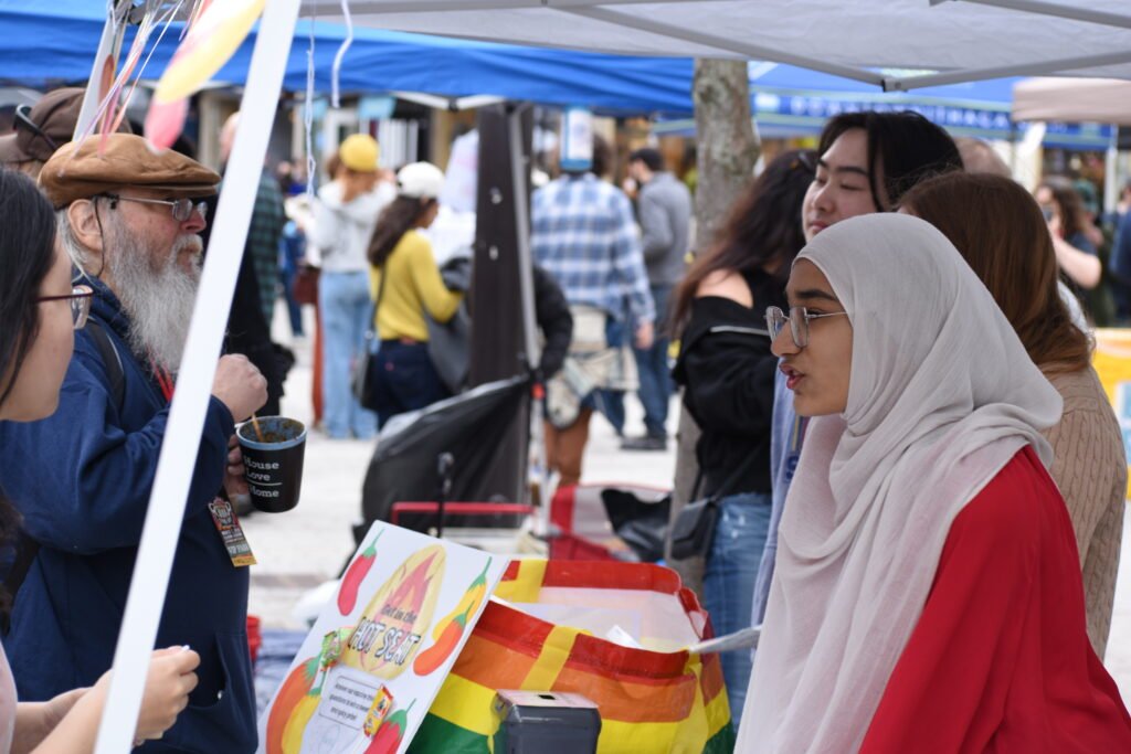Home VaCS volunteers talking with community members at the 2026 Downtown Ithaca Chili Cook-Off in Ithaca, NY